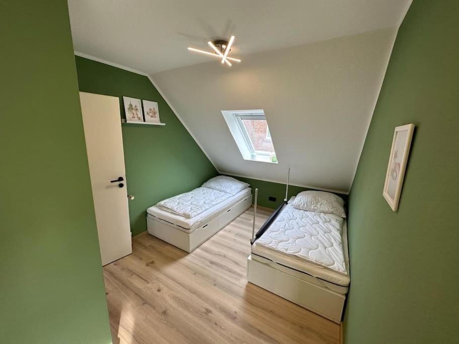 Apartamento Haus Zuckersnuut Dornum Exterior foto