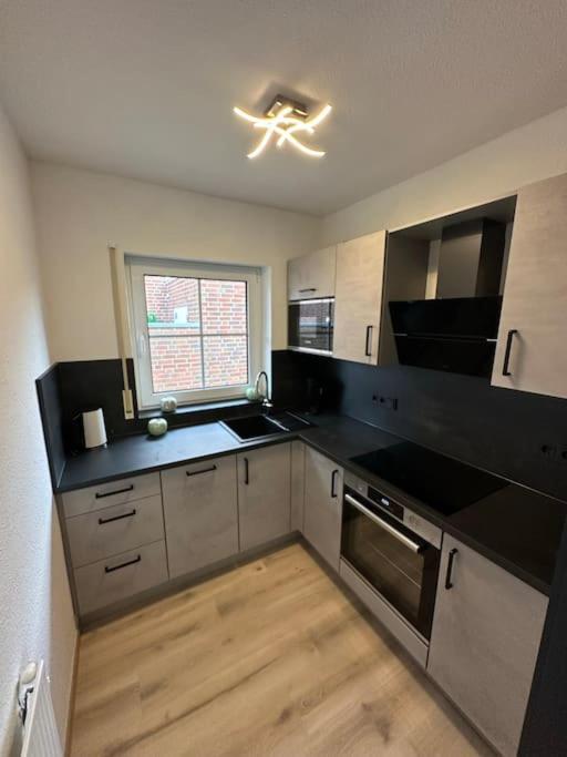 Apartamento Haus Zuckersnuut Dornum Exterior foto