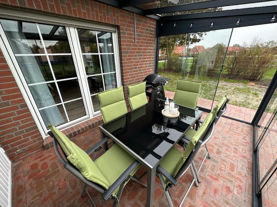 Apartamento Haus Zuckersnuut Dornum Exterior foto