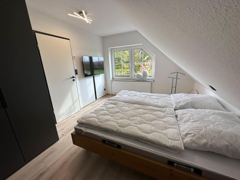 Apartamento Haus Zuckersnuut Dornum Exterior foto