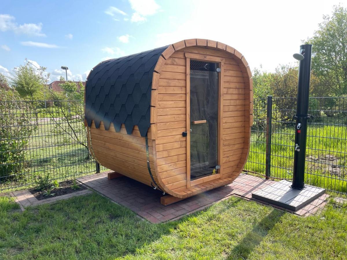 Apartamento Haus Zuckersnuut Dornum Exterior foto